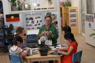 Ed and three children indoor table 3