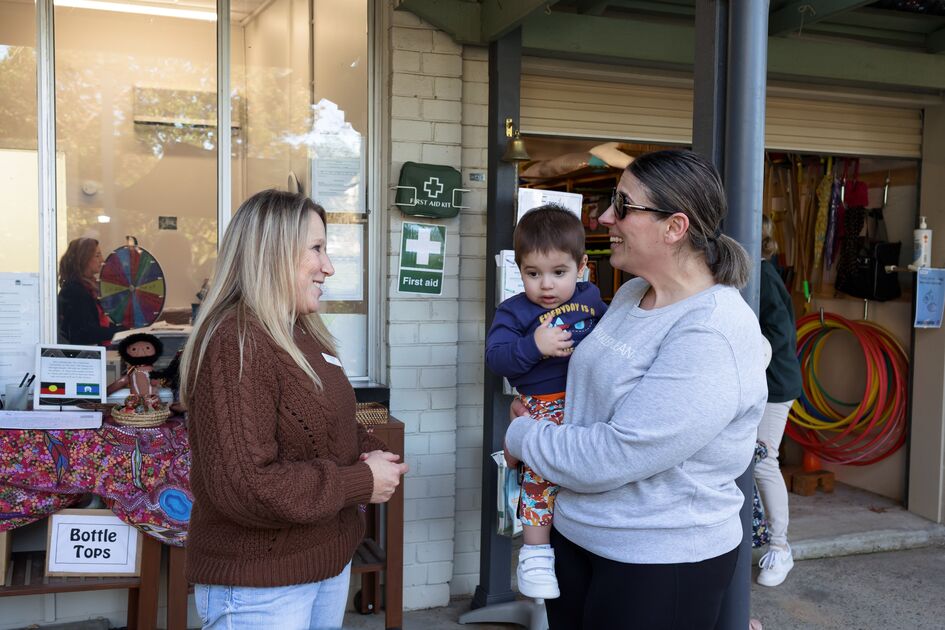 Director talking with parent