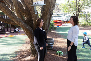 Kelly and Tracy under tree