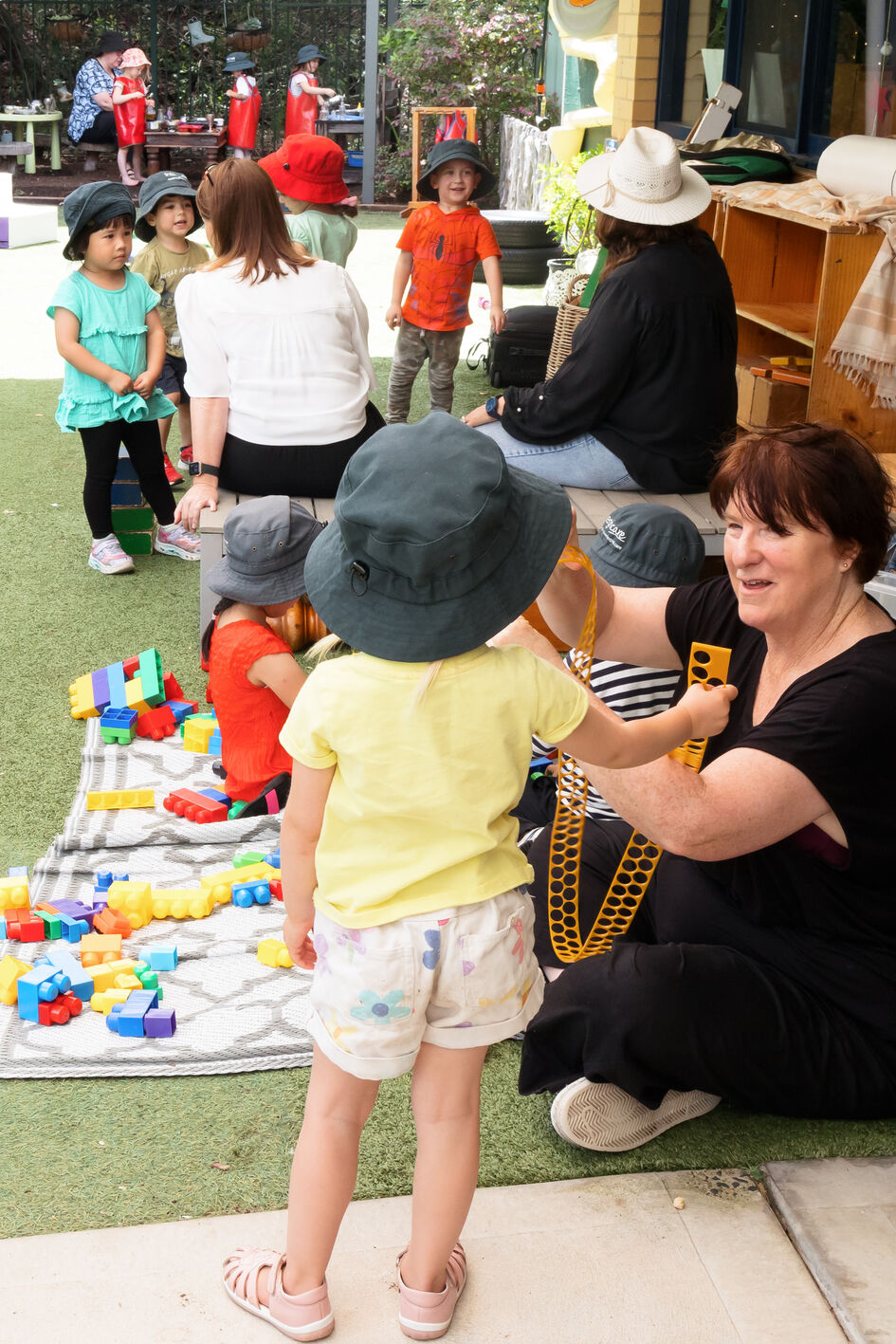 Jen talking with child
