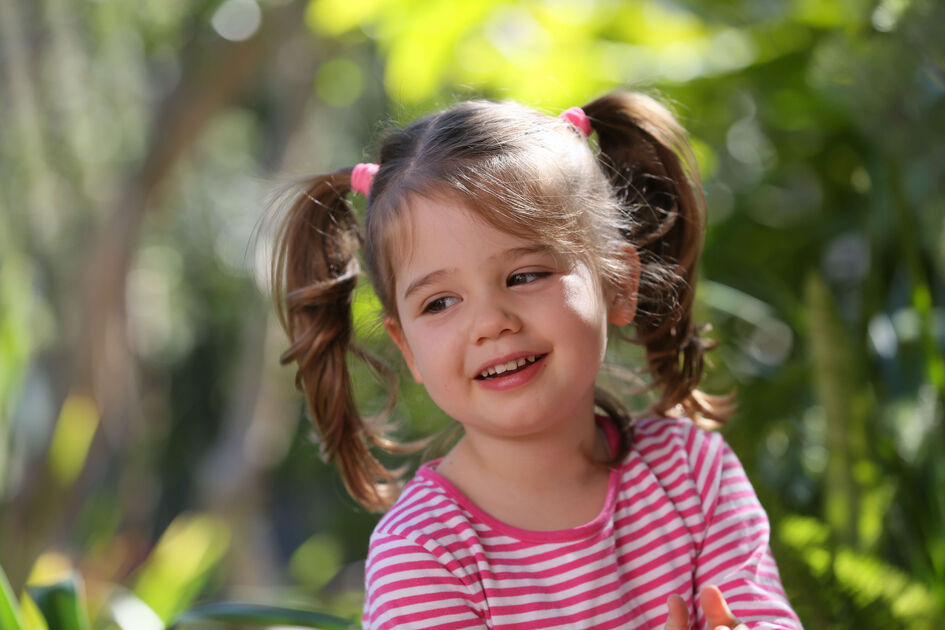 Girl striped shirt smiling