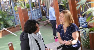 Bel and educator talking outside with resource 1 2021 02 25 010753